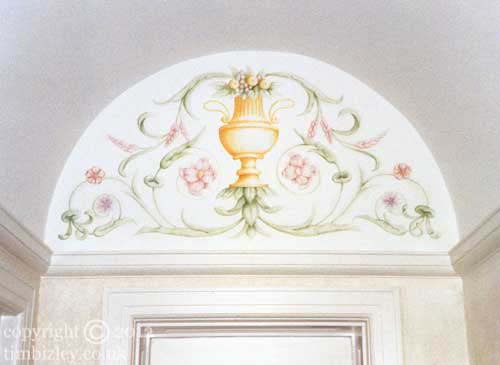 painted green acanthus leaves and pink flowers in panel