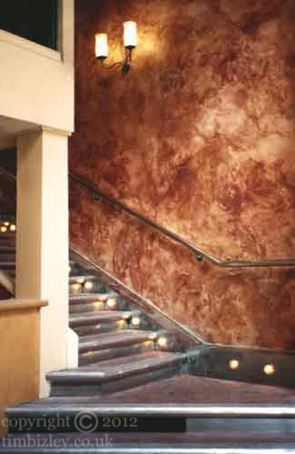 swirling pattern paint effects on walls decorate restaurant entrance