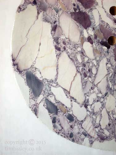 detail of marbling with paint to make guitar look like mauve marble