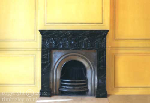 black and white marbleising fire surround against yellow walls