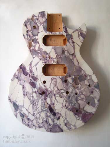 marbleizing of a guitar body to look like breche violette marble