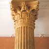 a corinthian column decorated with paint to look like stone