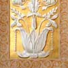gold leaf contrasts with grisaille painted mural elements