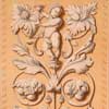 cherubs and accanthus leaves grisaille painted plaster relief