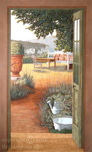 painted mural veiw through an open door of provencal garden and landscape scene