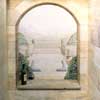 painted stone arch window veiw of mountains landscape