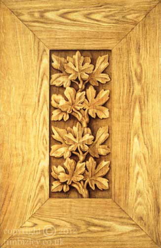 trompe l'oeil painting of panel of carved brown oak