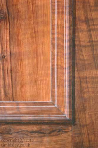 wood paint effect showing detail of walnut woodgrained trompe l'oeil panel