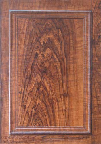 wood paint effect imitating English Walnut in an illusionistically painted panel